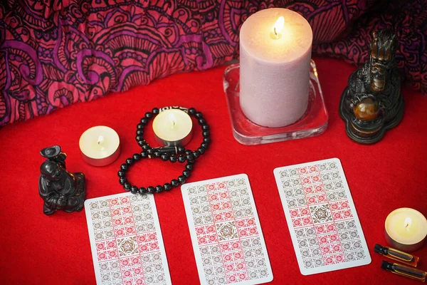 depositphotos_438465046-stock-photo-fortune-telling-tarot-cards-high